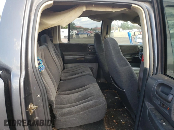 2004 Dodge Dakota Sport z VIN 1D7HG38N64S688604, wystawiony jako Copart lot #79811934 z przebiegiem 160 377 mil mil oraz Szkoda całkowita • Salvage title. Historia ofert i sprzedaży dostępna na DreamBid. Obrazek 11.