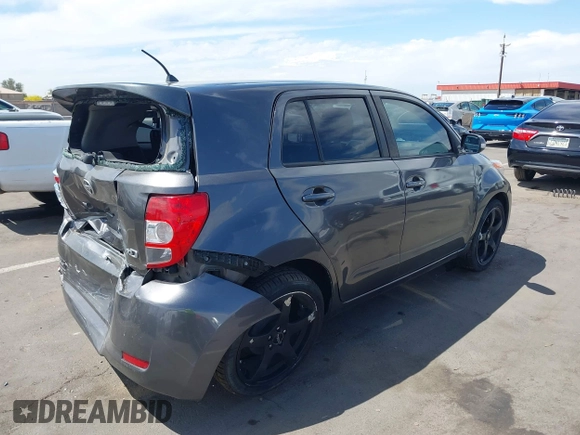 2008 Scion xD with VIN JTKKU10498J025371, listed as a IAAI auction lot 42018309 with 90,192 mi miles. Bid and sale history available at carsss.com. Image 4.
