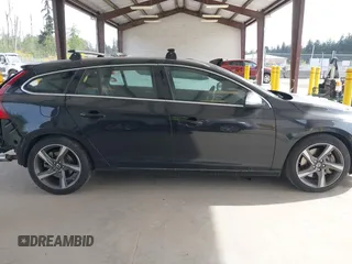 2015 Volvo V60 z VIN YV1902SH9F1190853, wystawiony jako IAAI lot #42237421 z przebiegiem 49 122 mil mil oraz . Historia ofert i sprzedaży dostępna na DreamBid. Obrazek 13.