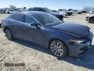 2019 Mazda 3 Premium with VIN 3MZBPAEM1KM101129, listed as a Copart auction lot 47113795 with 38,329 mi miles and Salvage Title. Bid and sale history available at DreamBid. Image 4.