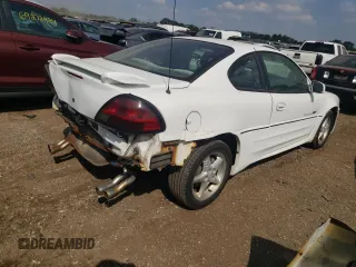1999 Pontiac Grand Am GT with VIN 1G2NW12E0XM853038, listed as a Copart auction lot 69262194 with 162,986 mi miles and Salvage Title. Bid and sale history available at carsss.com. Image 3.
