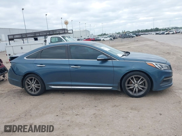 2015 Hyundai Sonata Sport with VIN 5NPE34AB5FH163825, listed as a IAAI auction lot 42013743 with Not Provided miles and . Bid and sale history available at carsss.com. Image 14.