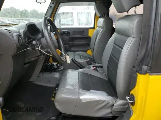 2009 Jeep Wrangler X с VIN 1J4FA24169L775219, выставлен на аукционе Copart как лот 71110304 с пробегом 132 886 миль миль и Списание • Salvage title. История ставок и продаж доступна на DreamBid. Изображение 7.