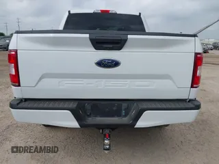 2018 Ford F-150 XL with VIN 1FTEW1C52JKC49228, listed as a IAAI auction lot 42162616 with 148,329 mi miles. Bid and sale history available at carsss.com. Image 16.