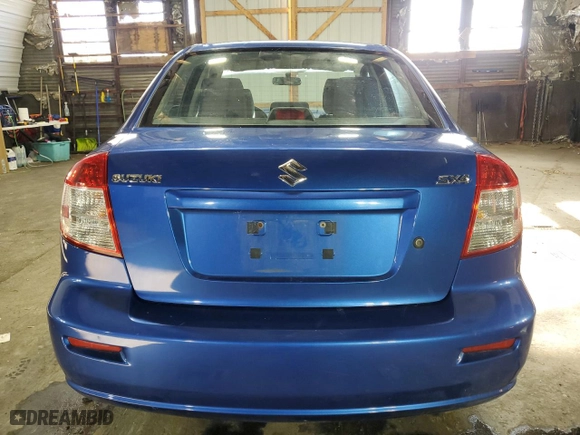 2013 Suzuki SX4 LE with VIN JS2YC5A36D6102850, listed as a Copart auction lot 82205134 with 70,776 mi miles and Salvage Title. Bid and sale history available at carsss.com. Image 6.
