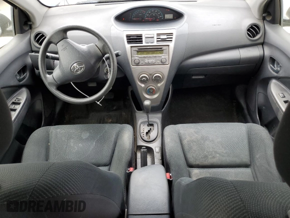 2012 Toyota Yaris with VIN JTDBT4K38CL036729, listed as a Copart auction lot 53514995 with 232,180 mi miles and Salvage Title. Bid and sale history available at DreamBid. Image 8.
