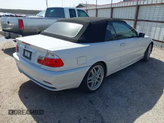 2001 BMW 3 Series 330Ci with VIN WBABS53401JU88051, listed as a IAAI auction lot 41704279 with 196,223 mi miles. Bid and sale history available at carsss.com. Image 4.