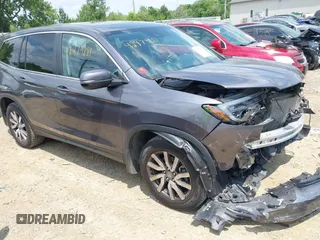 2021 Honda Pilot EX-L z VIN 5FNYF6H51MB077312, wystawiony jako IAAI lot #42479881 z przebiegiem 64 838 mil mil oraz . Historia ofert i sprzedaży dostępna na DreamBid. Obrazek 1.