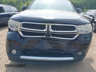2013 Dodge Durango Crew z VIN 1C4RDJDG3DC685995, wystawiony jako IAAI lot #42490067 z przebiegiem 205 806 mil mil oraz . Historia ofert i sprzedaży dostępna na DreamBid. Obrazek 12.