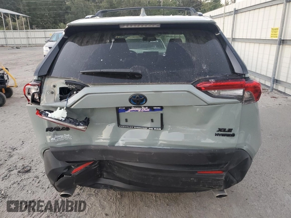 2021 Toyota RAV4 Hybrid XLE with VIN JTMRWRFV5MD136071, listed as a Copart auction lot 76898674 with 33,973 mi miles and Salvage Title. Bid and sale history available at carsss.com. Image 6.