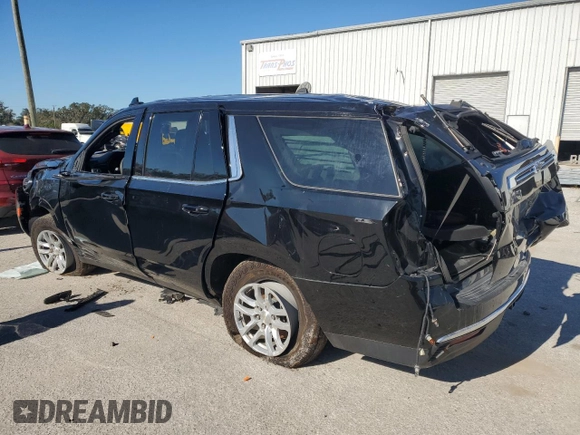 2021 Chevrolet Tahoe Commercial with VIN 1GNSKLED9MR390007, listed as a Copart auction lot 83274554 with 63,602 mi miles and Clean title. Bid and sale history available at DreamBid. Image 2.