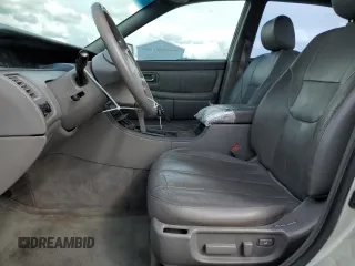 2000 Toyota Avalon XL with VIN 4T1BF28B3YU002835, listed as a Copart auction lot 50902115 with 128,699 mi miles and Salvage Title. Bid and sale history available at DreamBid. Image 7.