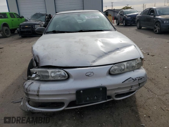 2003 Oldsmobile Alero GL1 z VIN 1G3NL52E83C168023, wystawiony jako Copart lot #76242984 z przebiegiem 154 718 mil mil oraz Szkoda całkowita • Salvage title. Historia ofert i sprzedaży dostępna na DreamBid. Obrazek 5.