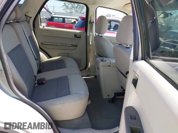 2008 Ford Escape Hybrid z VIN 1FMCU49H88KB89767, wystawiony jako IAAI lot #42650593 z przebiegiem 127 093 mil mil oraz . Historia ofert i sprzedaży dostępna na DreamBid. Obrazek 8.