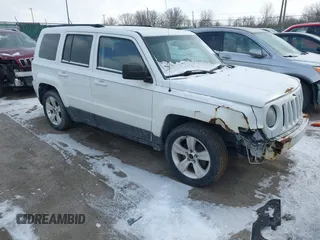 2014 Jeep Patriot Latitude with VIN 1C4NJPFA6ED502457, listed as a IAAI auction lot 41334385 with 160,600 mi miles and . Bid and sale history available at carsss.com. Image 1.