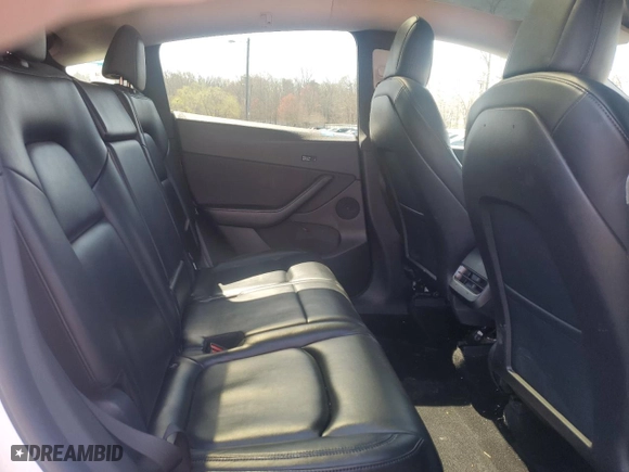 2021 Tesla Model Y Long Range with VIN 5YJYGAEE9MF191031, listed as a Copart auction lot 52014195 with 105,534 mi miles and Clean Title. Bid and sale history available at carsss.com. Image 10.