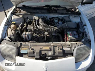 1995 Pontiac Sunfire SE z VIN 1G2JB1244S7508975, wystawiony jako Copart lot #76954164 z przebiegiem 76 187 mil mil oraz Tytuł czysty. Historia ofert i sprzedaży dostępna na DreamBid. Obrazek 11.
