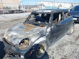 2008 MINI Hardtop with VIN WMWMF33508TU64051, listed as a IAAI auction lot 41485793 with Not Provided miles and . Bid and sale history available at DreamBid. Image 2.