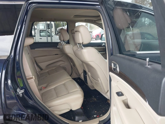 2014 Jeep Grand Cherokee Limited with VIN 1C4RJFBG4EC347208, listed as a IAAI auction lot 41982209 with 124,663 mi miles and . Bid and sale history available at DreamBid. Image 8.