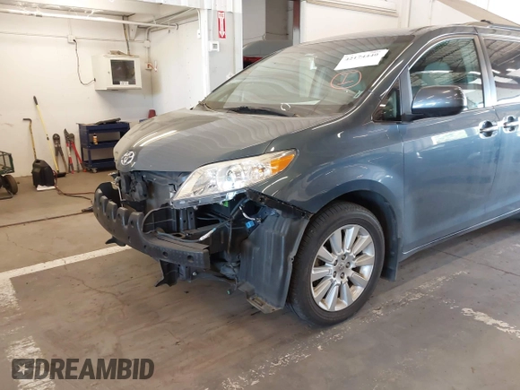 2014 Toyota Sienna Limited with VIN 5TDDK3DC6ES076022, listed as a IAAI auction lot 42174440 with 112,630 mi miles and . Bid and sale history available at DreamBid. Image 6.