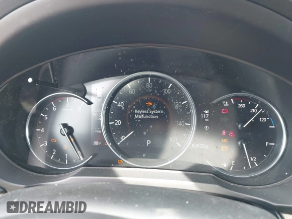 2019 Mazda CX-5 Signature with VIN JM3KFBEY1K0512880, listed as a IAAI auction lot 42036904 with 92,650 mi miles. Bid and sale history available at carsss.com. Image 7.