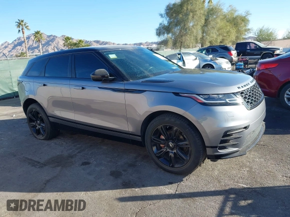 2020 Land Rover Range Rover Velar R-Dynamic S with VIN SALYK2EX7LA288847, listed as a IAAI auction lot 41108872 with 74,734 mi miles. Bid and sale history available at carsss.com. Image 1.