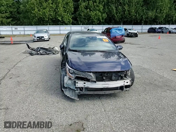 2020 Toyota Corolla SE with VIN JTDP4RCE3LJ004394, listed as a Copart auction lot 55039085 with 98,579 mi miles and Salvage Title. Bid and sale history available at DreamBid. Image 14.