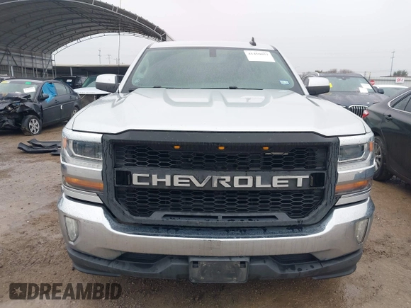 2018 Chevrolet Silverado 1500 LT with VIN 1GCRCREC4JZ287085, listed as a IAAI auction lot 41450057 with 79,275 mi miles and . Bid and sale history available at DreamBid. Image 12.