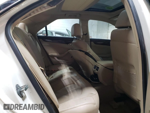 2013 Cadillac CTS Premium z VIN 1G6DS5E3XD0101681, wystawiony jako Copart lot #41334385 z przebiegiem 49 646 mil mil oraz Szkoda całkowita • Salvage title. Historia ofert i sprzedaży dostępna na DreamBid. Obrazek 11.