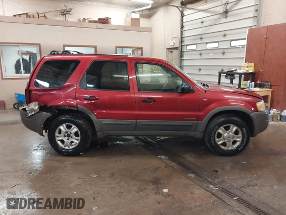 2001 Ford Escape XLT with VIN 1FMYU04101KF46809, listed as a IAAI auction lot 41664202 with 256,468 mi miles. Bid and sale history available at carsss.com. Image 13.