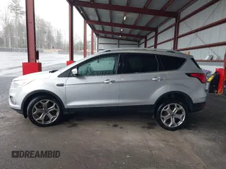 2019 Ford Escape Titanium with VIN 1FMCU9J9XKUA37695, listed as a IAAI auction lot 41868388 with 50,095 mi miles. Bid and sale history available at carsss.com. Image 14.