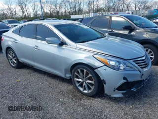 2017 Hyundai Azera with VIN KMHFG4JG4HA588091, listed as a IAAI auction lot 41983350 with 99,801 mi miles and . Bid and sale history available at carsss.com. Image 1.
