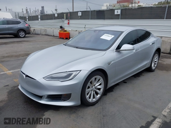 2016 Tesla Model S 90D with VIN 5YJSA1E23GF138925, listed as a IAAI auction lot 42408676 with 48,399 mi miles and . Bid and sale history available at DreamBid. Image 2.