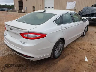 2013 Ford Fusion Titanium Hybrid with VIN 3FA6P0RU2DR308696, listed as a IAAI auction lot 41914944 with 133,710 mi miles. Bid and sale history available at carsss.com. Image 4.