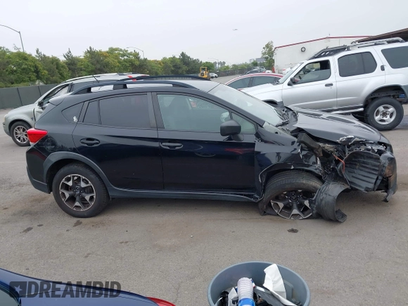 2020 Subaru Crosstrek z VIN JF2GTABC2L8200422, wystawiony jako IAAI lot #42475059 z przebiegiem 112 876 mil mil oraz . Historia ofert i sprzedaży dostępna na DreamBid. Obrazek 13.