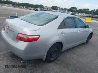 2007 Toyota Camry CE with VIN 4T1BE46K97U621990, listed as a IAAI auction lot 41907054 with 136,067 mi miles. Bid and sale history available at carsss.com. Image 4.