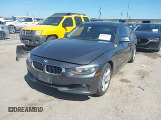 2012 BMW 3 Series 328i with VIN WBA3A5C53CFJ89806, listed as a IAAI auction lot 41703272 with 111,238 mi miles. Bid and sale history available at carsss.com. Image 2.