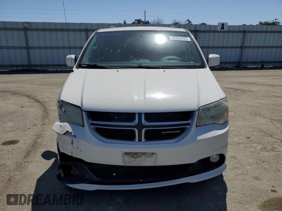 2011 Dodge Grand Caravan Crew with VIN 2D4RN5DG4BR699707, listed as a Copart auction lot 52055425 with 144,904 mi miles and Salvage Title. Bid and sale history available at DreamBid. Image 5.