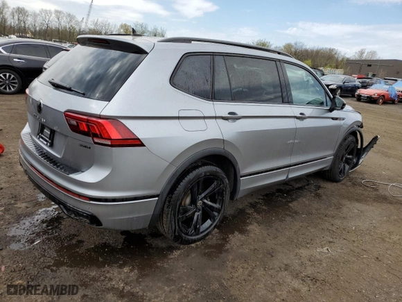 2023 Volkswagen Tiguan SE R-Line Black with VIN 3VV8B7AX8PM023049, listed as a Copart auction lot 51946414 with 20,761 mi miles and Salvage Title. Bid and sale history available at carsss.com. Image 3.