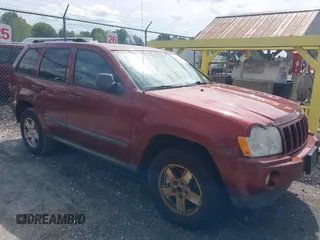 2007 Jeep Grand Cherokee Laredo z VIN 1J8HR48N87C609080, wystawiony jako IAAI lot #42391793 z przebiegiem 159 096 mil mil oraz . Historia ofert i sprzedaży dostępna na DreamBid. Obrazek 1.
