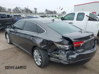 2015 Toyota Avalon Limited with VIN 4T1BK1EB4FU167011, listed as a IAAI auction lot 41582722 with 77,314 mi miles and . Bid and sale history available at DreamBid. Image 3.