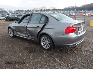 2011 BMW 3 Series 328i xDrive with VIN WBAPK7G58BNN78269, listed as a IAAI auction lot 41904907 with 86,003 mi miles. Bid and sale history available at carsss.com. Image 3.