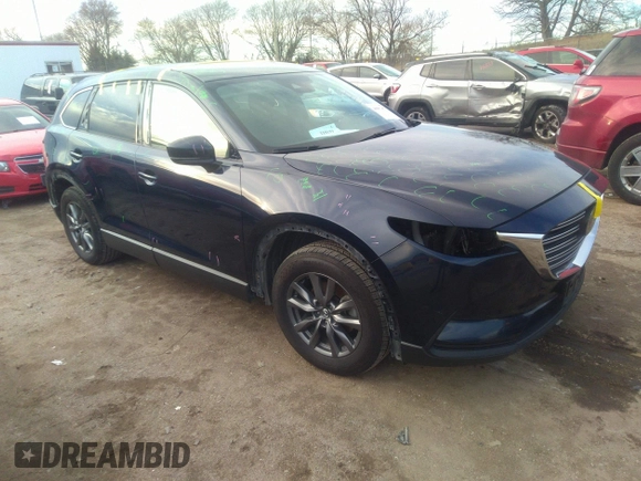 2021 Mazda CX-9 Sport with VIN JM3TCBBY4M0519407, listed as a IAAI auction lot 40883497 with 90,205 mi miles and . Bid and sale history available at carsss.com. Image 1.