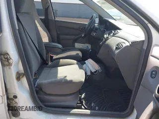 2003 Ford Focus SE Fleet z VIN 1FAFP36393W343129, wystawiony jako IAAI lot #42440063 z przebiegiem 184 413 mil mil oraz . Historia ofert i sprzedaży dostępna na DreamBid. Obrazek 5.