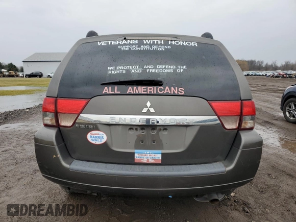 2011 Mitsubishi Endeavor LS with VIN 4A4JN2AS6BE032693, listed as a Copart auction lot 86910564 with 130,097 mi miles and Salvage Title. Bid and sale history available at carsss.com. Image 6.