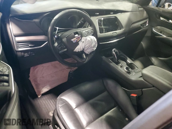 2023 Cadillac XT4 AWD Premium Luxury z VIN 1GYFZDR47PF209282, wystawiony jako Copart lot #51175635 z przebiegiem Nie podano mil oraz Szkoda całkowita • Salvage title. Historia ofert i sprzedaży dostępna na DreamBid. Obrazek 8.