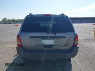 2002 Jeep Grand Cherokee with VIN 1J8GW48N72C207838, listed as a IAAI auction lot 42020294 with 181,283 mi miles and . Bid and sale history available at DreamBid. Image 17.