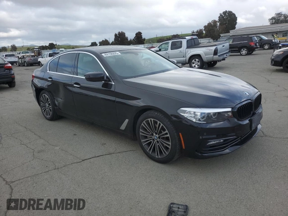 2018 BMW 5 Series 530i with VIN WBAJA5C51JWA38499, listed as a Copart auction lot 49150205 with 59,521 mi miles and Salvage Title. Bid and sale history available at DreamBid. Image 4.
