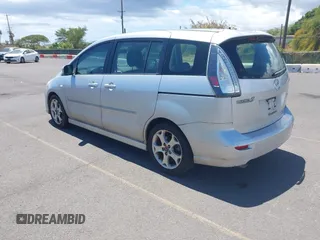 2009 Mazda 5 Sport with VIN JM1CR293990334438, listed as a IAAI auction lot 42561953 with 118,178 mi miles and . Bid and sale history available at DreamBid. Image 3.
