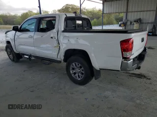 2016 Toyota Tacoma SR with VIN 5TFCZ5AN9GX014233, listed as a Copart auction lot 52016485 with 260,017 mi miles and Salvage Title. Bid and sale history available at carsss.com. Image 2.